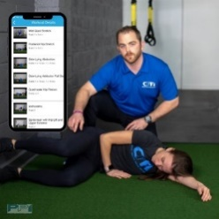 Physical therapist adjusting patient through stretches