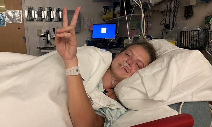 Hogan-Reed-Hospital-Bed-Peace-Sign-Rectangle