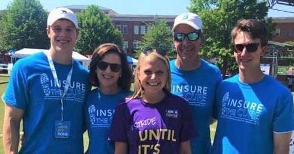 A picture of Clay Snellings and his family at a Great Strides walk
