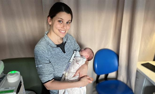 Jenessa Kildew Holding Newborn