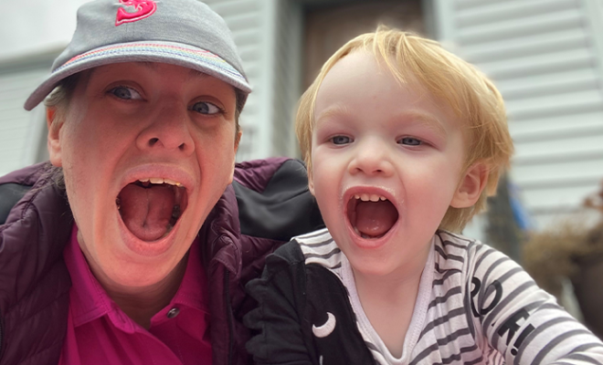 Kelsey Scott making silly faces with her son.