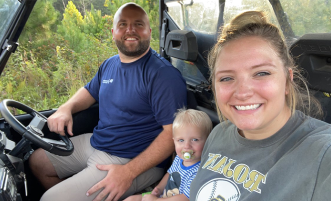 Breanne with her husband and son.