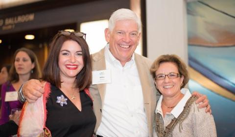 Ginger and Mike, photographed here with Maureen Fraser, vice president of field management, have been longtime supporters of the CF Foundation.