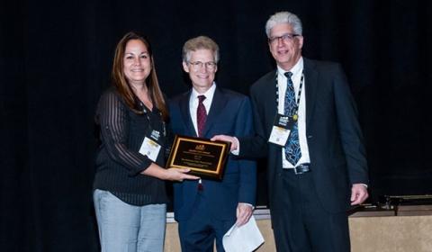 Bruce C. Marshall, M.D., presented the Quality Care Award to the Minnesota CF Center. 